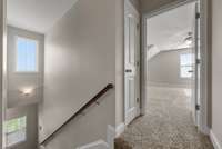 The large bonus room/rec room could be used as an additional bedroom. This room features an attached full bathroom - the THIRD full bath in the home!