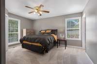 Primary suite with attached bath. Full of natural light.