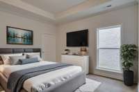 Primary bedroom, there are TWO on the main level!
**Virtually Staged Photo**