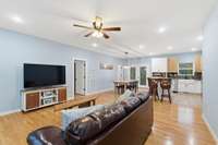 From front door looking though den to kitchen and dining room.