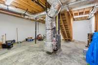 Another view of livable side of basement.