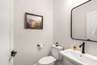 Downstairs half bath next to office