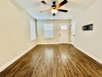 Vacant Living room from kitchen bar.