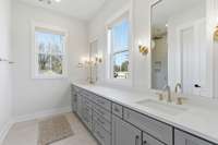 Extended Double Vanities with tons of storage + gorgeous sconces