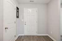 Front door and door to garage.