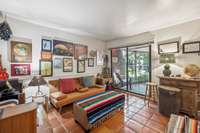 Downstair bedroom with access to Screened in porch. ( Currently used as a Den )