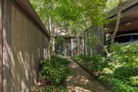 Lovely entrance way besides garage  to front door.