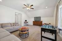 Media room, home-school desk area, yoga or gym spot, or maybe an additional set of beds for sleepovers and visitors, this area is very functional to accommodate your needs.  The two doors lead to a closet and the laundry room.