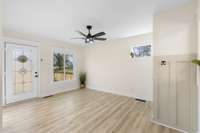 Bright, welcoming living space with fresh paint and flooring!