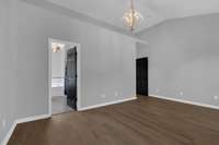 Another view of the Master Suite leading into the Master Bathroom