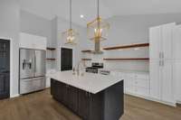 This beautiful kitchen is the heart of the home, offering a warm and welcoming space filled with natural light.