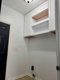 Laundry room leading out to garage