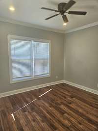 3rd bedroom.  Notice the Levolar blinds. This.is the kind you can pull up and down and they stay where you adjust them.