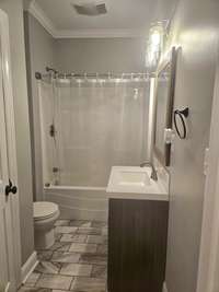 Second bathroom also has a large closet and tile flooring.