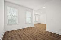 Sitting room can be used in so many ways - office, gym, reading room, etc. Options are endless giving you more livable and usable space downstairs!