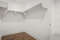 Primary closet #2 with WOOD Shelving!