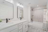 Large Secondary Bathroom with QUARTZ countertops and SOFT CLOSE cabinets!