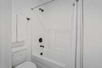 *Photos for example only* Private toilet and tub/shower