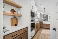 *Photos for example only* Butler Pantry with QUARTZ countertops, SOFT CLOSE drawers/doors, and walk in pantry!