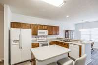 The central location of the kitchen is perfect for every day life as well as entertaining.