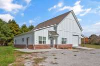 Welcome Home!  1180 Snell Rd is a 2-year old Modern Farmhouse, on a level 1.2 acre lot, located in beautiful Lewisburg, TN    PULL THROUGH GARAGE IS 17' x 41' with a 10' tall garage door entrance