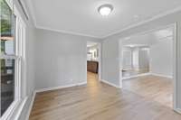 Another view of the dining room into the living and kitchen space