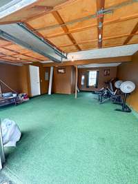 garage has indoor outdoor carpet . perfect for pool table or work out area, he cave or she cave :)