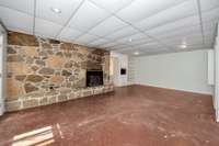 Other room- built in shelving, fireplace, recessed lighting
