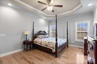 Primary Suite offers spacious area with walk -in closet.