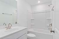 Bathroom 3
(photo is of a finished similar home- options and colors may vary in actual home)