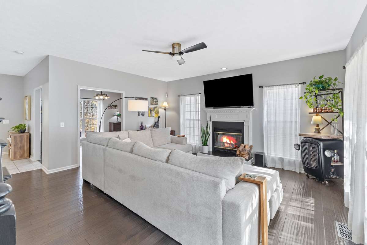 Spacious great room with hardwoods and fireplace