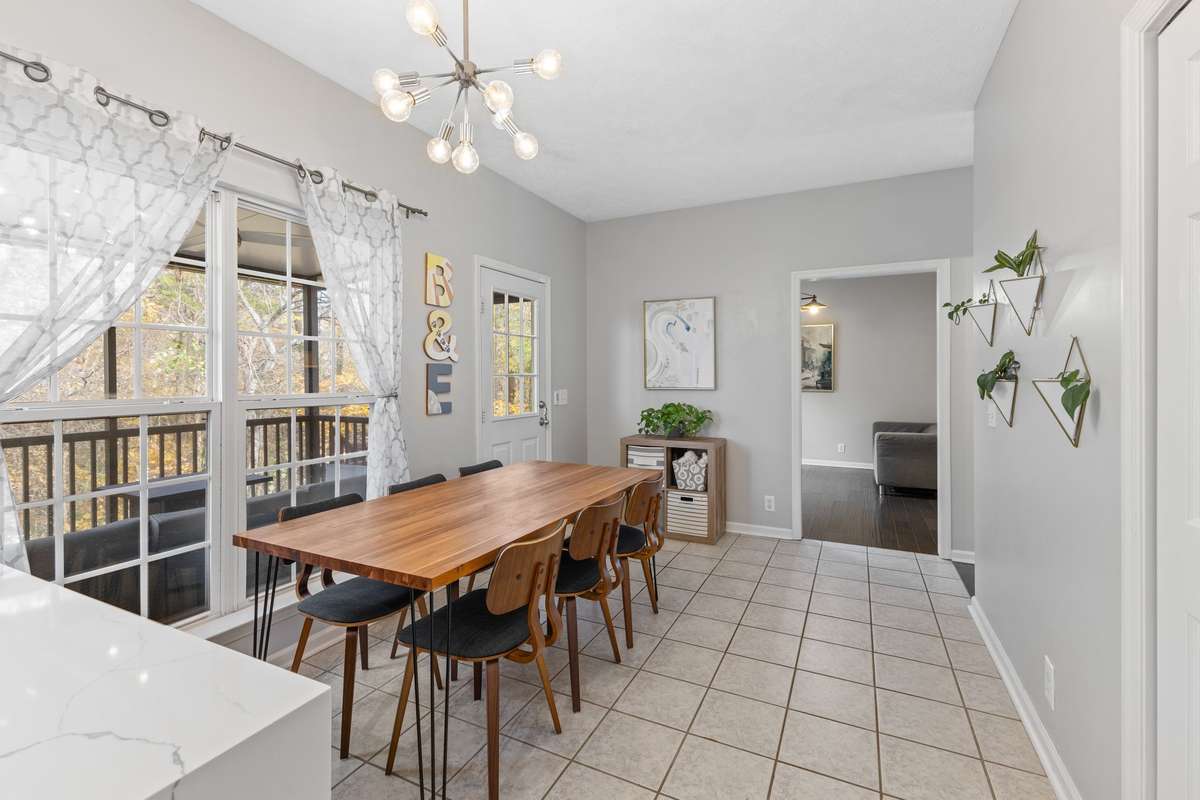 Casual dining overlooks beautiful backyard