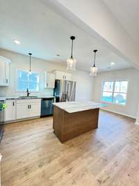 Building progress photos as of 12/20/2025.