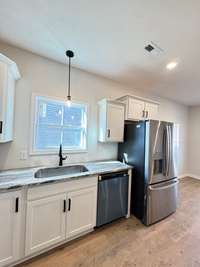 Building progress photos as of 12/20/2025.