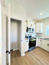 Building progress photos as of 12/20/2025.