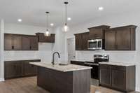 Example Photos, colors and materials may vary