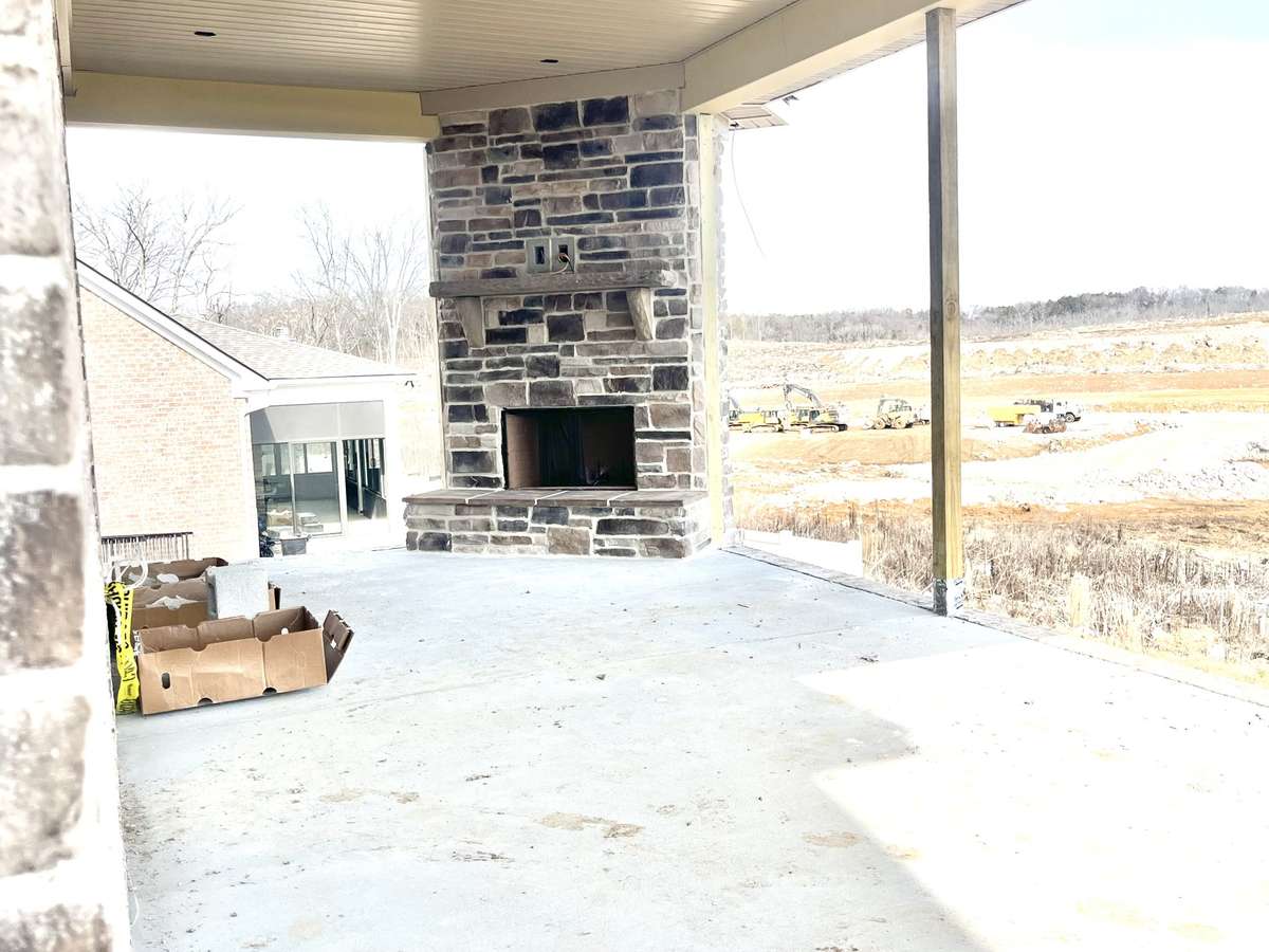 The actual brown blended stone on your fireplace. The same will be on indoor fireplace.