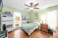 Second bedroom also has two large windows and a ceiling fan.  715 Pine Ridge Rd Lexington TN 38351