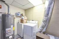 Utility room on the lower level provides additional storage opportunities.  715 Pine Ridge Rd Lexington TN 38351