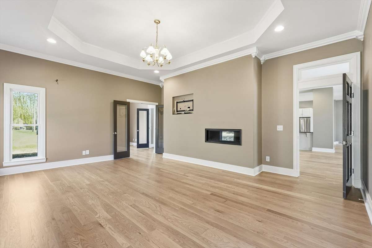 Primary Bedroom | Main Level | Fireplace