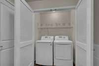 LG brand washer and dryer remain.  Nice utility room off of garage entry into the home.