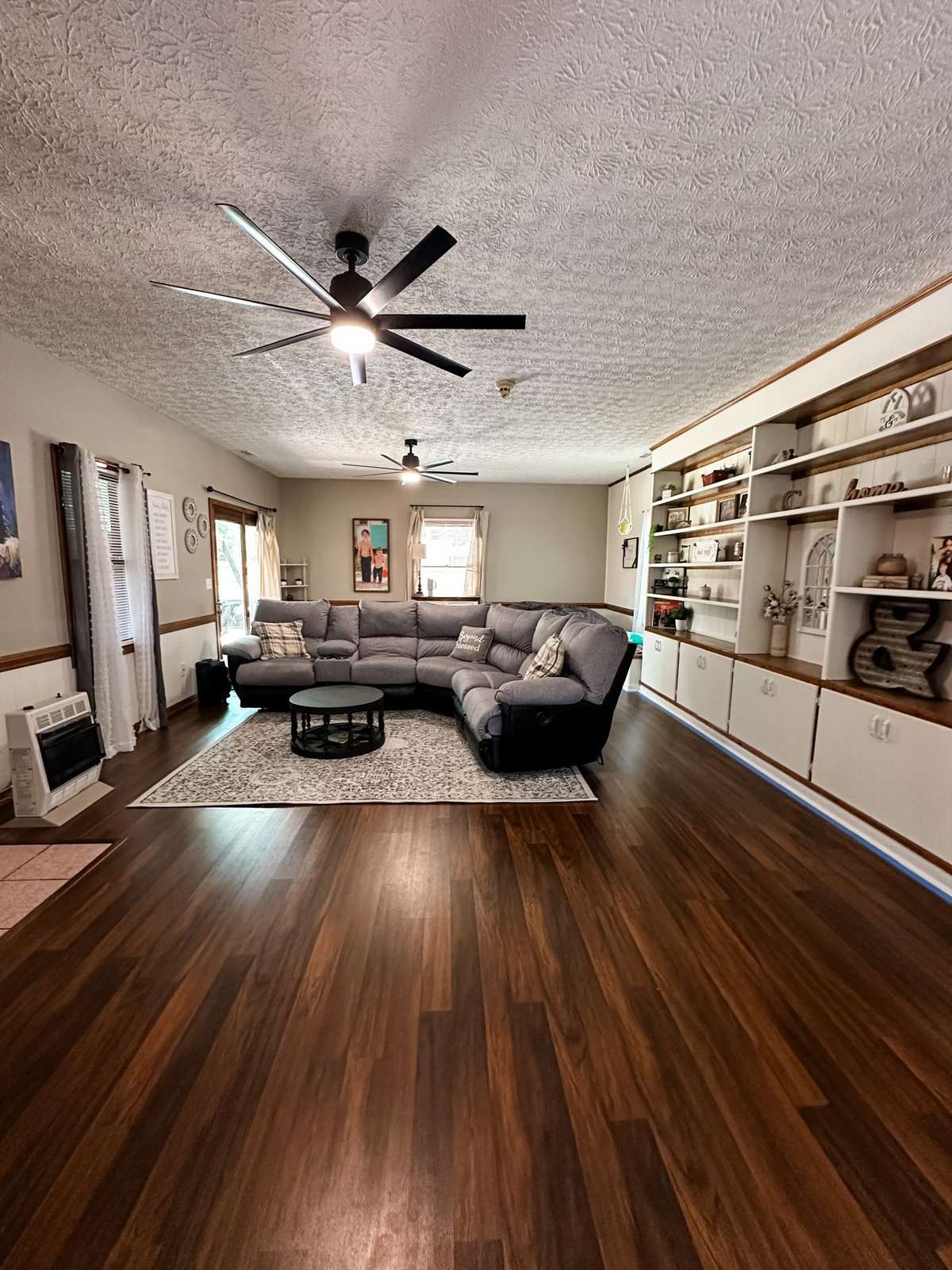 Large family room that leads out to the pool and fenced in back yard!!