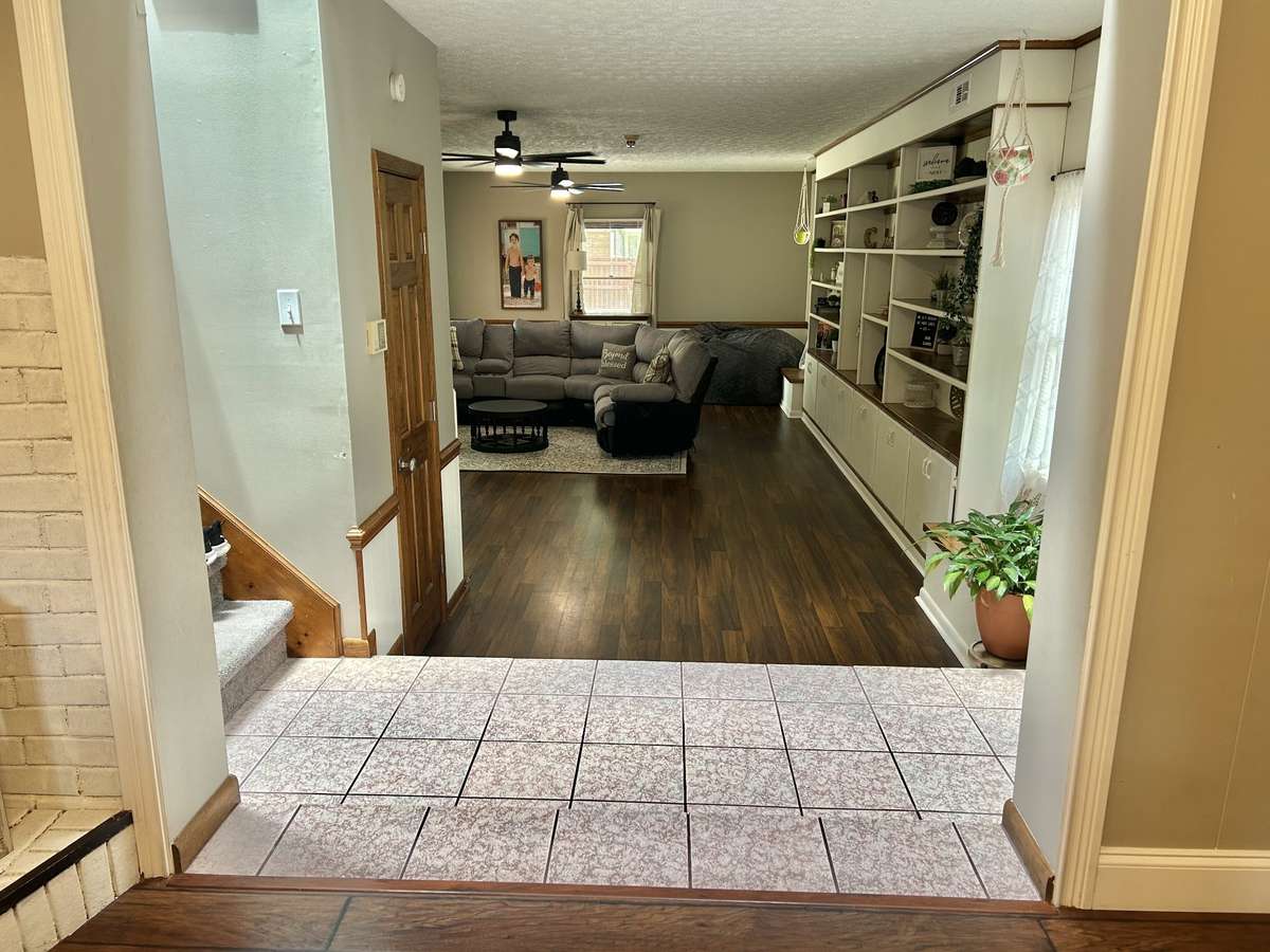 From the dining room looking into the large family room (2nd living room) that leads to the outdoor pool!!