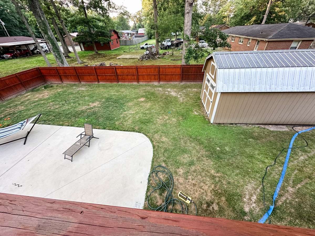 The mini barn will convey with the sale.