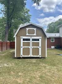 New mini barn that does convey with the property for additional storage!!