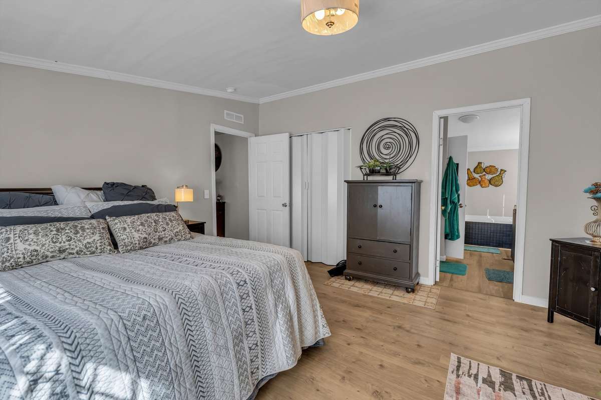Spacious primary bedroom with ensuite bathroom