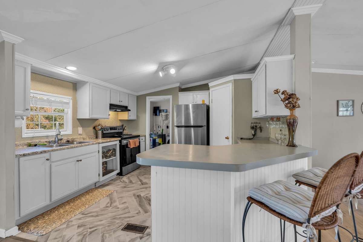 Kitchen is centrally located and easily accessible from all rooms