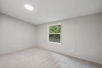 Peaceful views of the wooded backyard!