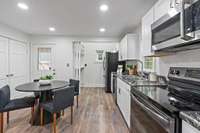 The kitchen is all set with stainless steel appliances. All kitchen appliances convey.