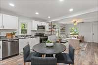 Gleaming countertops, fresh paint, and updated floors sets the tone for the downstairs common areas.